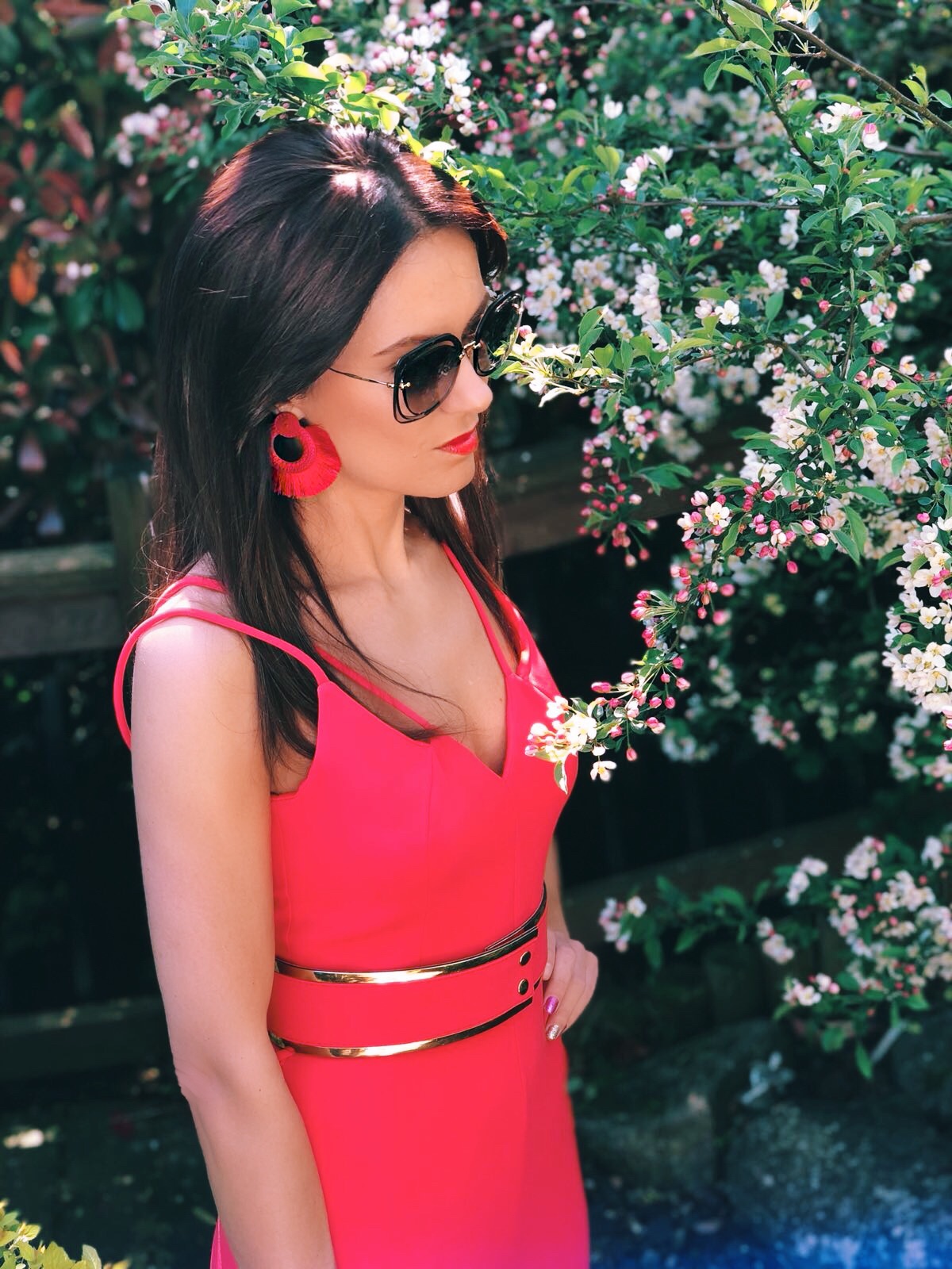 BROOKE - BRIGHT CORAL DOUBLE STRAP JUMPSUIT WITH GOLD WAISTBAND | South Beach Round Gold Woven Straw Cross Body Bag | Elegant Duchess Boutique Bohemian earrings