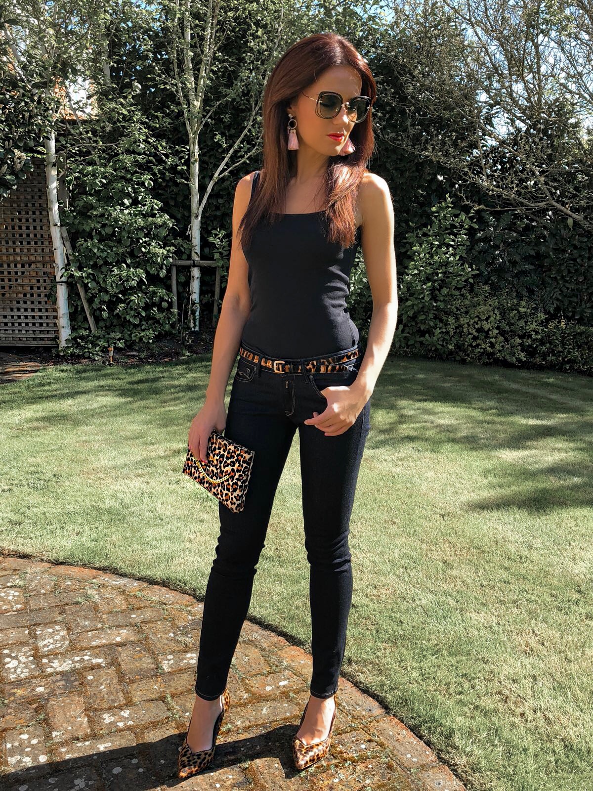 Elegant Duchess Fashion and Lifestyle Karen Millen Leather Chain Zip Clutch Bag, Leopard Print | Miu Miu sunglasses | Karen Millen leather Shoes Leopard Print | River Island tassel earrings | Replay Luz Mid Rise Rinse Jean with Contrast Stitch | Next Neutral Skinny Animal Print Belt