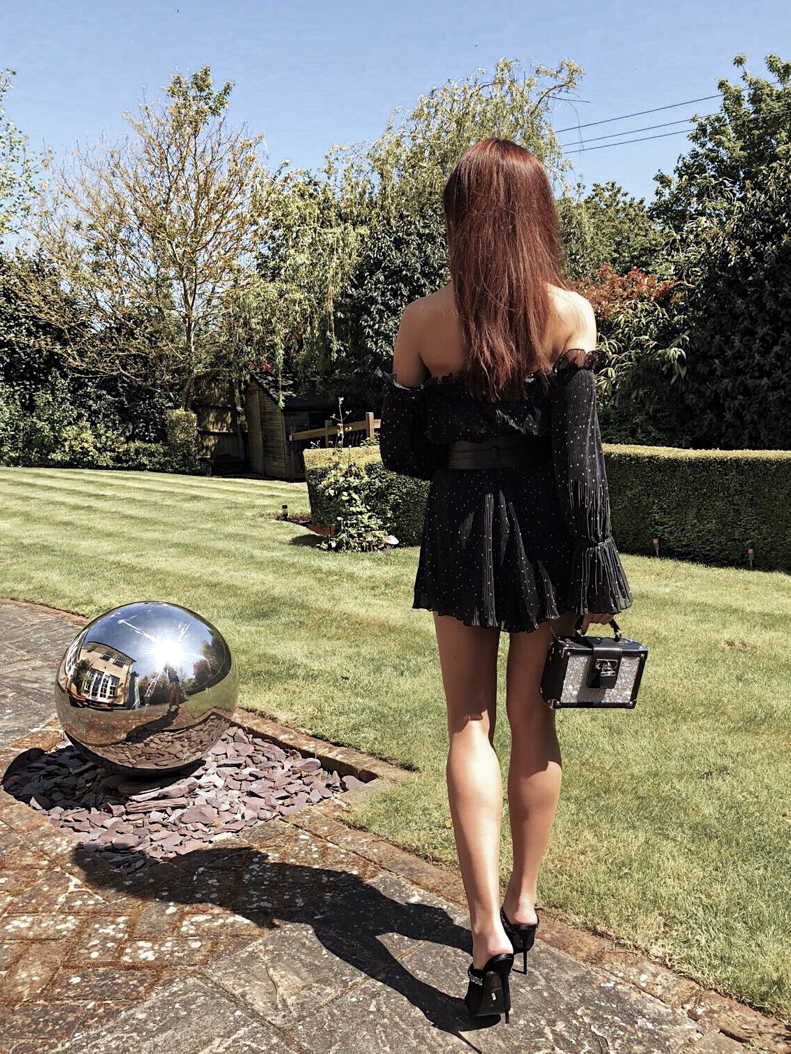 Elegant Duchess Fashion and Lifestyle ALDO Box Bag with Crystal Stud Detail | KURT GEIGER LONDON Lexington Jewelled Mule Heels | Forever Unique Black And White Polka Dot Playsuit | Miu Miu sunglasses | Swarovki crystal earrings