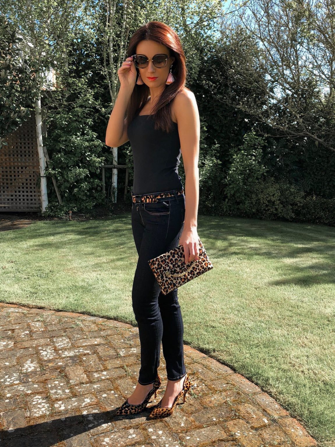 Elegant Duchess Fashion and Lifestyle Karen Millen Leather Chain Zip Clutch Bag, Leopard Print | Miu Miu sunglasses | Karen Millen leather Shoes Leopard Print | River Island tassel earrings | Replay Luz Mid Rise Rinse Jean with Contrast Stitch | Next Neutral Skinny Animal Print Belt