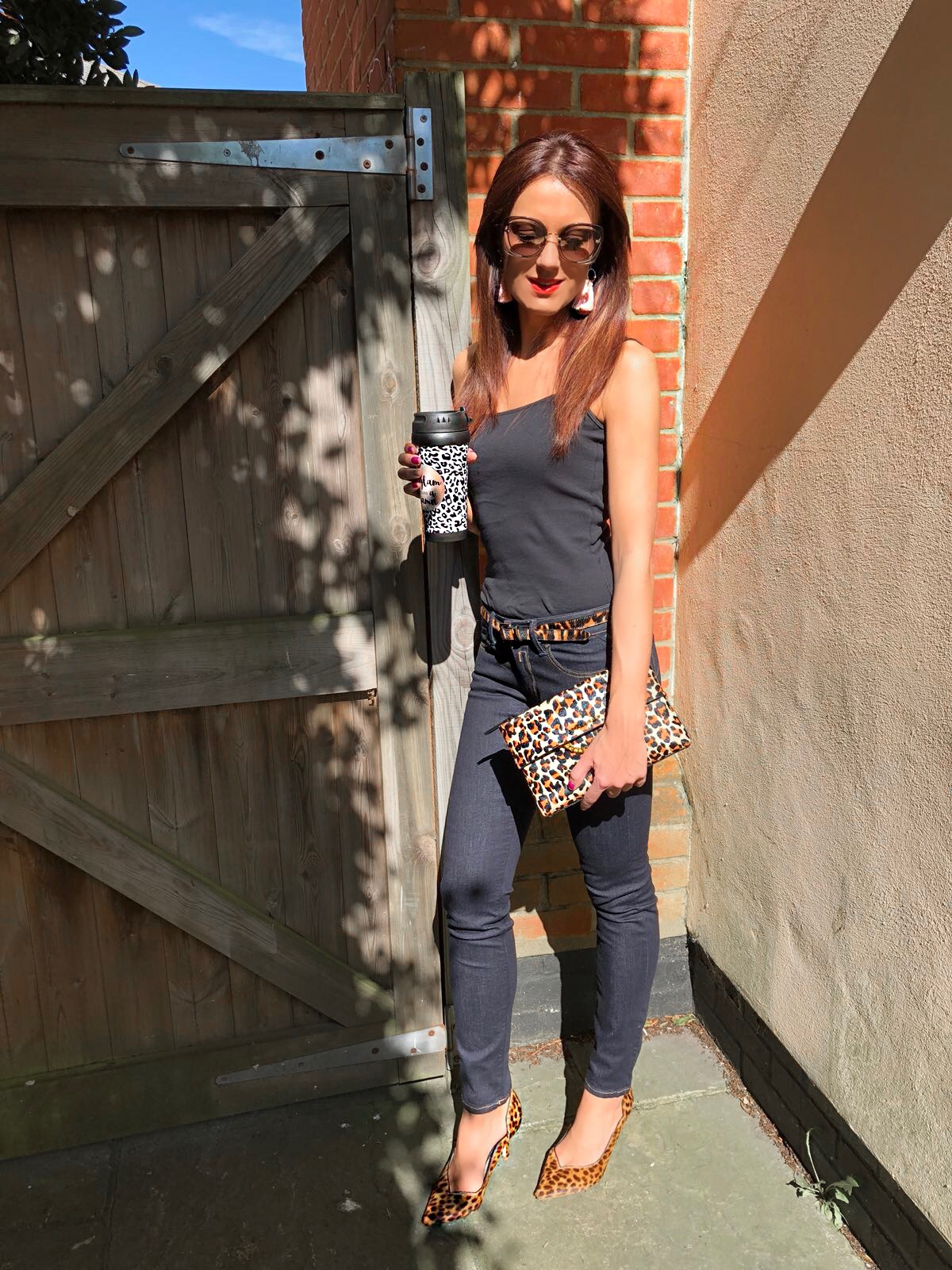 Elegant Duchess Fashion and Lifestyle Karen Millen Leather Chain Zip Clutch Bag, Leopard Print | Miu Miu sunglasses | Karen Millen leather Shoes Leopard Print | River Island tassel earrings | Replay Luz Mid Rise Rinse Jean with Contrast Stitch | Next Neutral Skinny Animal Print Belt