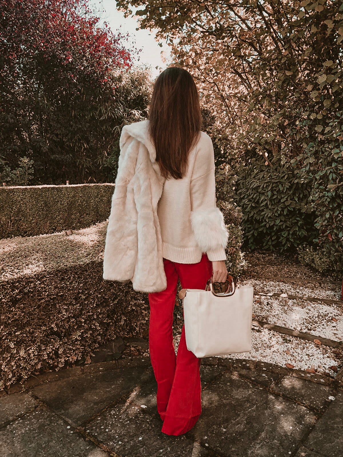 ASOS DESIGN slim kickflare trousers in Cord | Fashion Union Petite High Neck Jumper With Faux Fur Cuffs | Miu Miu sunglasses | Faith Handle Grab Bag | Faith Ankle Boot | Glamorous Faux Fur Coat