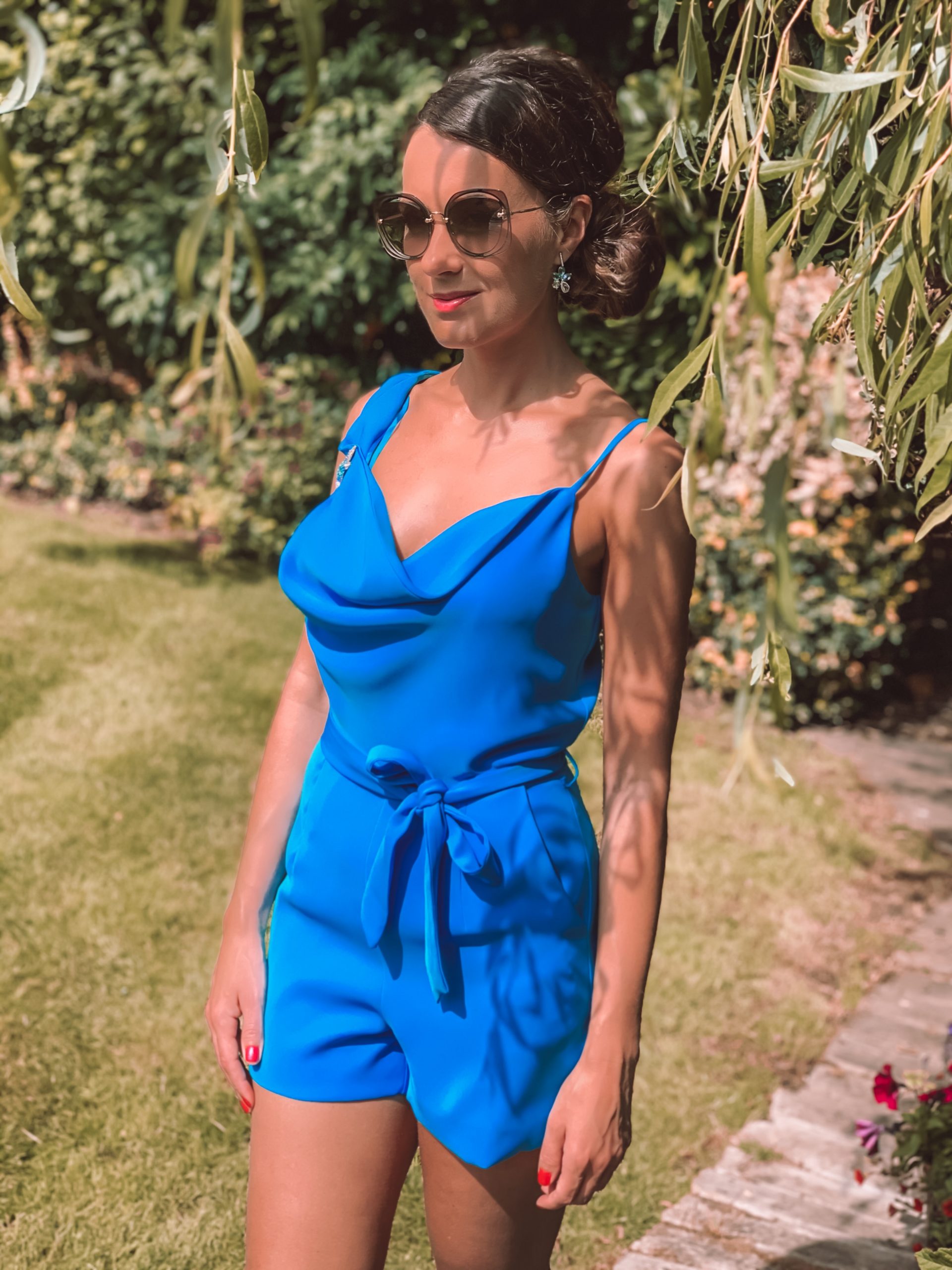 Lavish Alice Blue Playsuit | outfit ideas for a garden party | Miu Miu sunglasses | white mules | garden