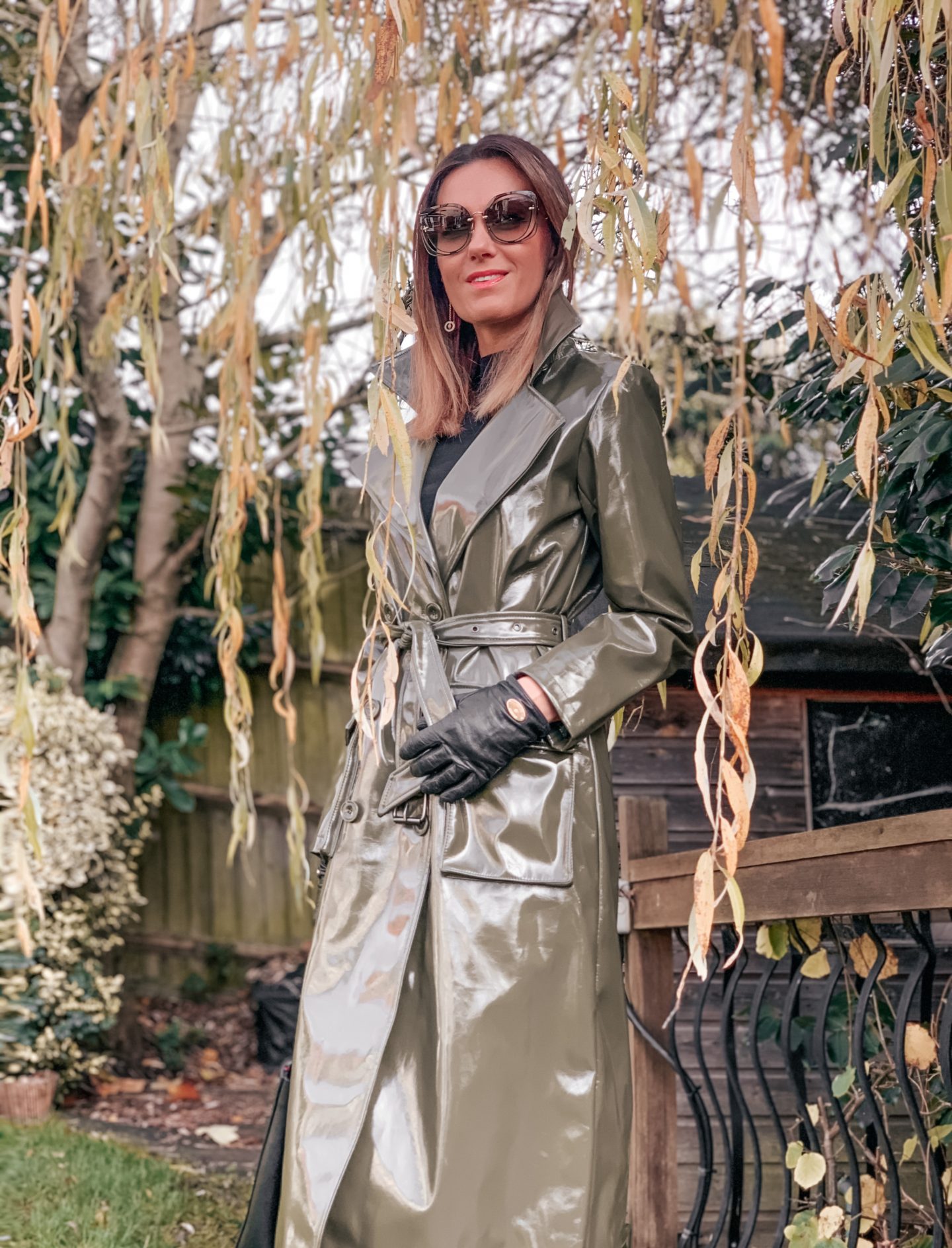 ASOS Urbancode high shine PU belted trench coat in khaki | Mulberry gloves | Miu Miu sunglasses